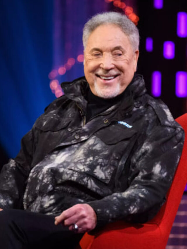 a person sitting in a red chair