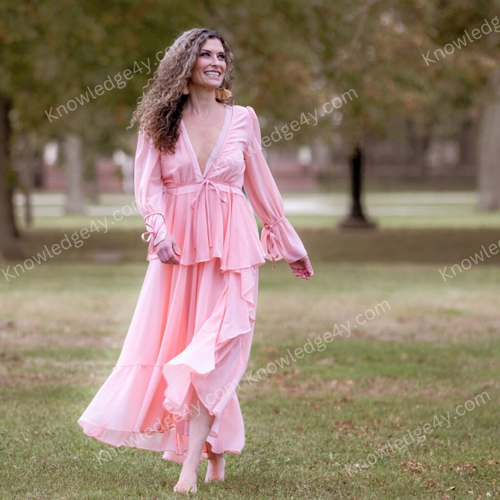 a person in a pink dress